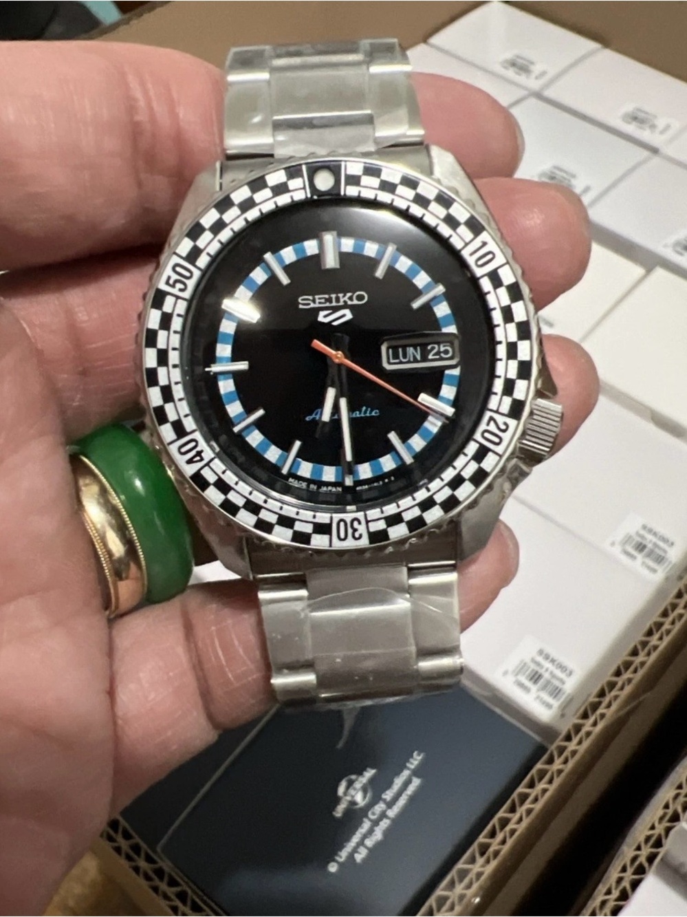 Seiko Stainless Steel Black Dial Watch with Blue Accents